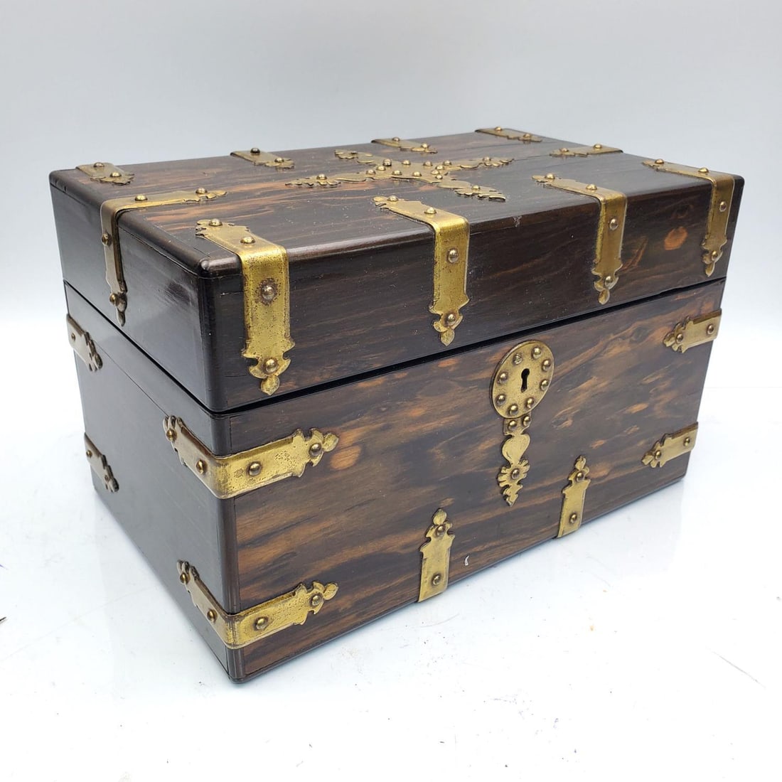Antique English 19th C. Coromandel Wood Tea Caddy: Antique English 19th Century Coromandel Wood Tea Caddy w/ Brass Mounts. Does Come w/ Key. Condition: Generally Very Good. Interior Compartment Lids are Monogrammed. Dimensions: L-10" x W-6" x H-6.25".