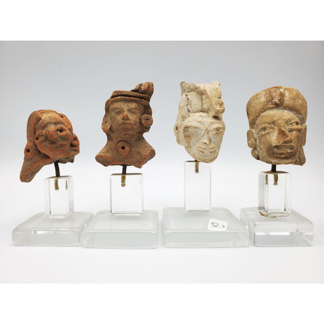 4 Small Pre-Columbian Clay Figures on Stands (1 of 4)