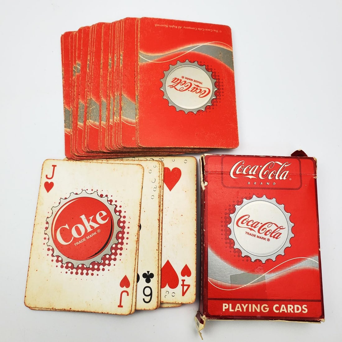 Vintage Coca-Cola Playing Cards: Vintage Coca-Cola Playing Cards. Condition: Sold As Is. Dimensions: Box L-2.5" x H-3.75". Provenance: From a Long Island, NY Home. Please note the absence of a Condition Report does not imply that the