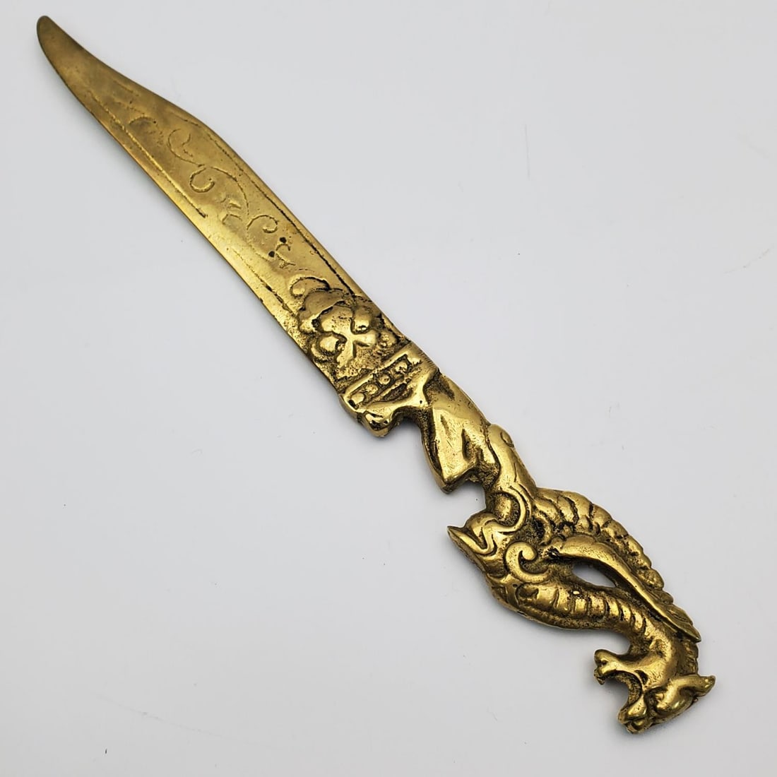 Vintage Novelty Brass Dragon Letter Opener: Vintage Novelty Brass Letter Opener w/ Welsh Dragon Handle. Condition: Generally Good. Dimensions: L-8.75". Provenance: From a Long Island, NY Home. Please note the absence of a Condition Report does 