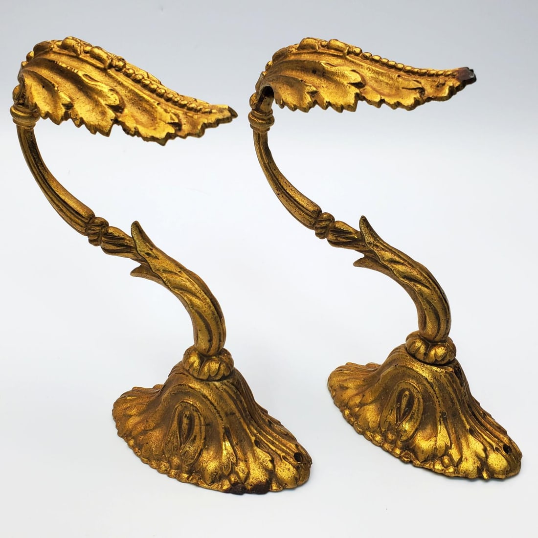 Antique Pair of Dore Bronze Drapery Hooks: Antique Pair of Dore Bronze Drapery Hooks. Probably French. Condition: Generally Good w/ Some Tarnishing. Dimensions: L-5.25" Each. Provenance: From a Long Island, NY Home. Please note the absence of 