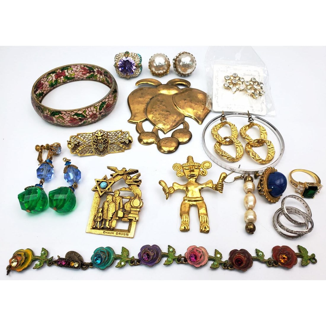Group Lot of Costume Jewelry: Group Lot of Costume Jewelry Including "Miriam Haskell" & "Chaim Gross" Examples. Condition: Generally Good. Dimensions: Various Sizes. Provenance: From a Long Island, NY Home. Please note the absence