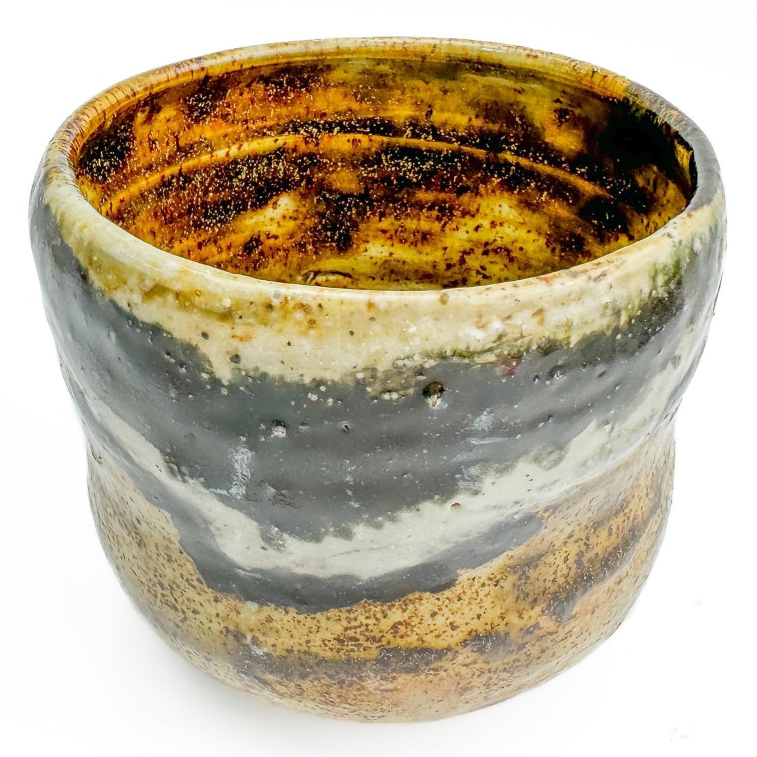 Japanese Multicolor Glazed Tea Bowl: Japanese Multicolor Glazed Tea Bowl. Condition: Generally Very Good. Dimensions: Dia-4.3" x H-3.8". Provenance: From a Long Island, NY Home. Please note the absence of a Condition Report does not impl