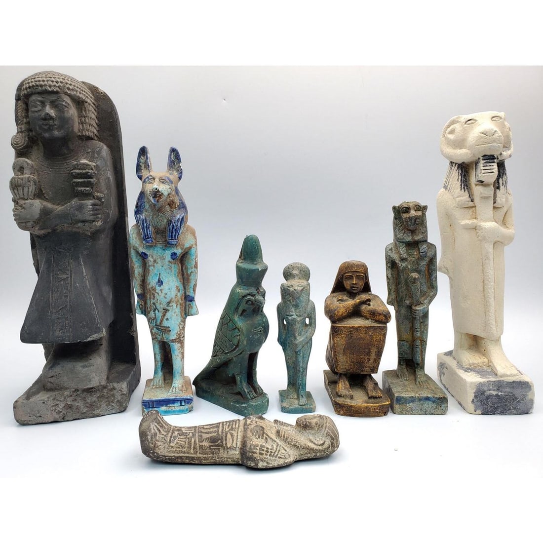 Lot of 8 Antique Egyptian Statues: Lot of 8 Antique Egyptian Statues. We Believe that some May be from Antiquity. Condition: Sold As Is / As Found. Dimensions: Largest H-11.5" x L-3.75" x W-3.75". Provenance: From a New York City Colle