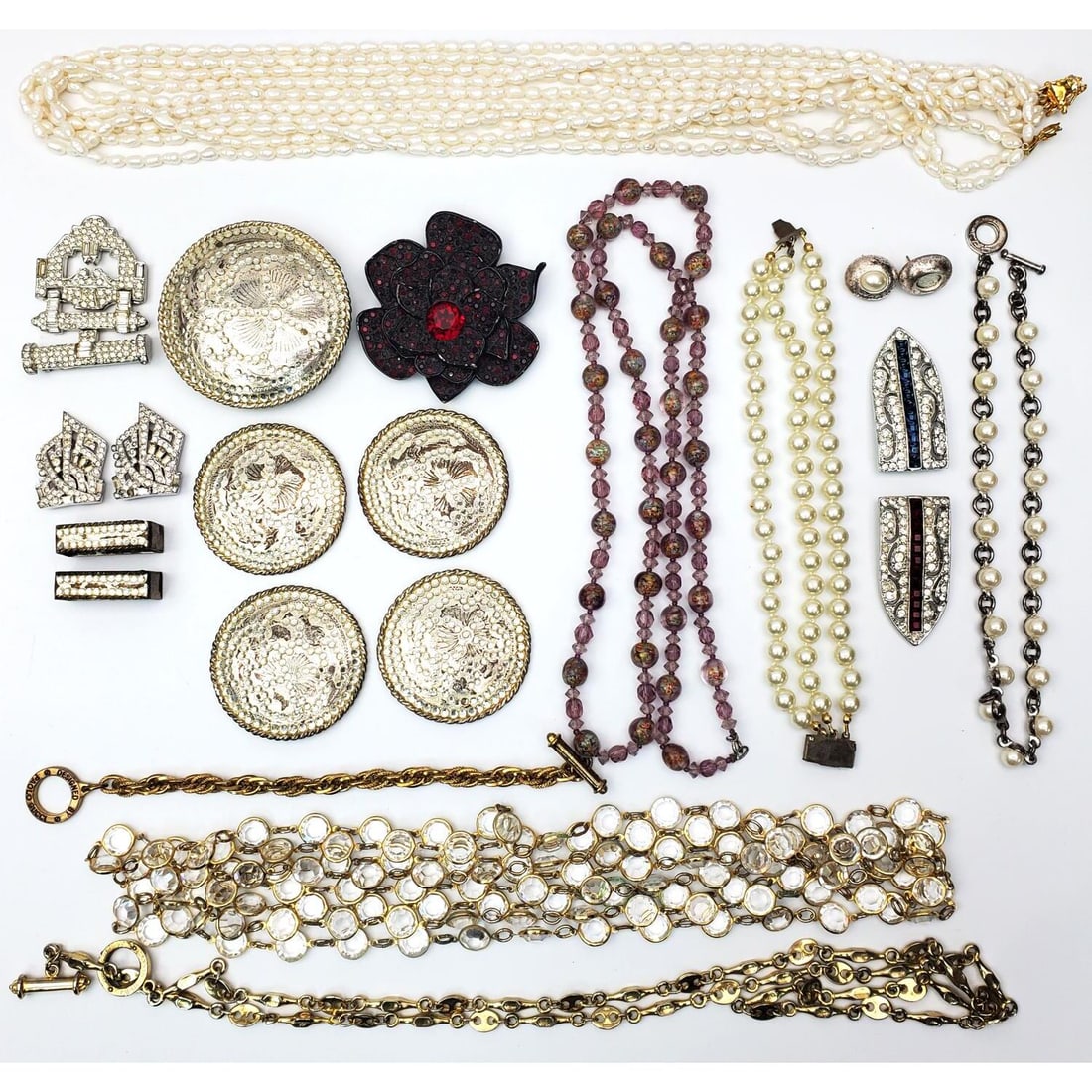 Lot of Vintage 1970s Costume Jewelry: Lot of Vintage 1970s Costume Jewelry Including Examples by Kenneth Lane & Paolo Gucci. Along w/ a Possibly Pearl Necklace & a Millefiori Necklace. Condition: Generally Good / As Found. Dimensions: Var