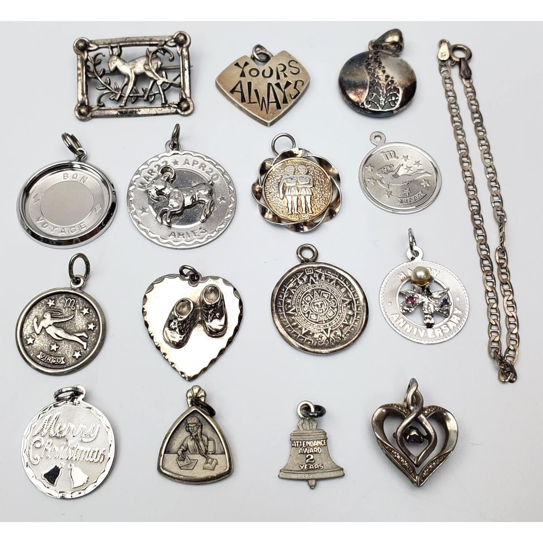 Lot of Silver Pendants: Lot of Silver Pendants. Condition: Generally Good w/ Some Tarnishing. Dimensions: Various Sizes. Gross Weight: 58g / 1.795ozt. Provenance: From a Long Island, NY Home. Please note the absence of a Con