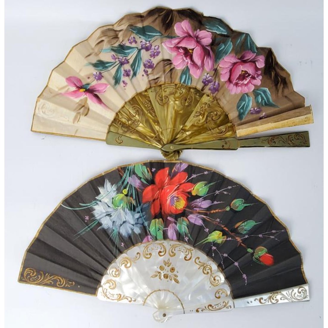 Lot of 2 Vintage Japanese Silk Fans: Lot of 2 Vintage Japanese Silk Fans. Condition: Generally Good w/ Some Separations. Sold As Is. Dimensions: Each L-8.5". Provenance: From a Long Island, NY Estate. Please note the absence of a Conditi
