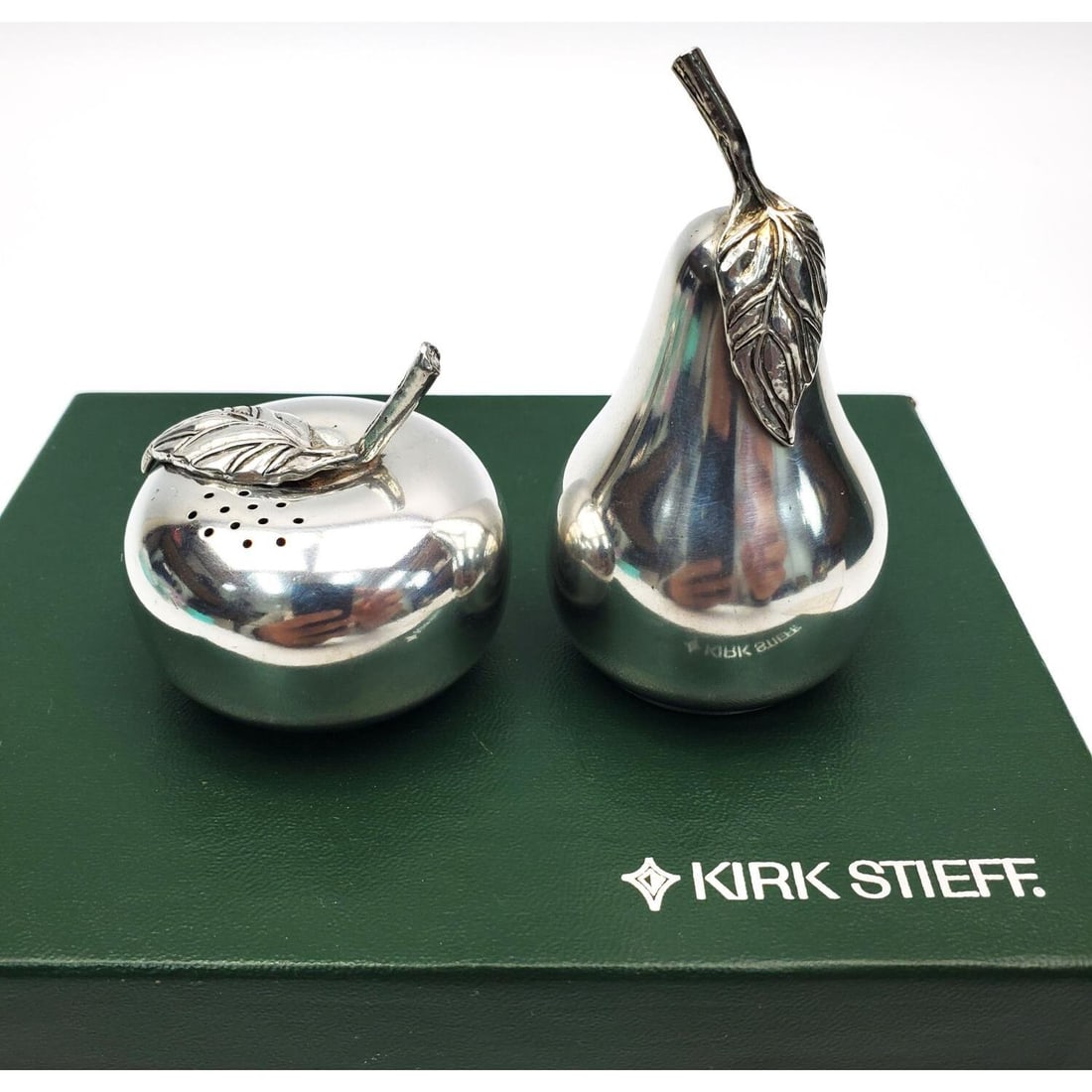 Vintage Kirk Stieff Salt & Pepper Shaker Set: Vintage Kirk Stieff Pewter Salt & Pepper Shaker Set in the Shape of an Apple & a Pear in Original Fitted Box. Condition: Generally Good. Dimensions: Box-6.1" x 5" x 2.6". Provenance: From a Long Islan