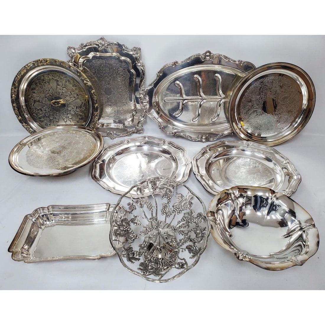 Lot of 9 Silver-Plated Items: Lot of 9 Silver-Plated Items Including 2 by Mappin & Webb. Fully Hallmarked. Condition: All Generally Good.Dimensions: Largest-19.5" x 13.5". Provenance: From a New Jersey Home. Please note the absenc