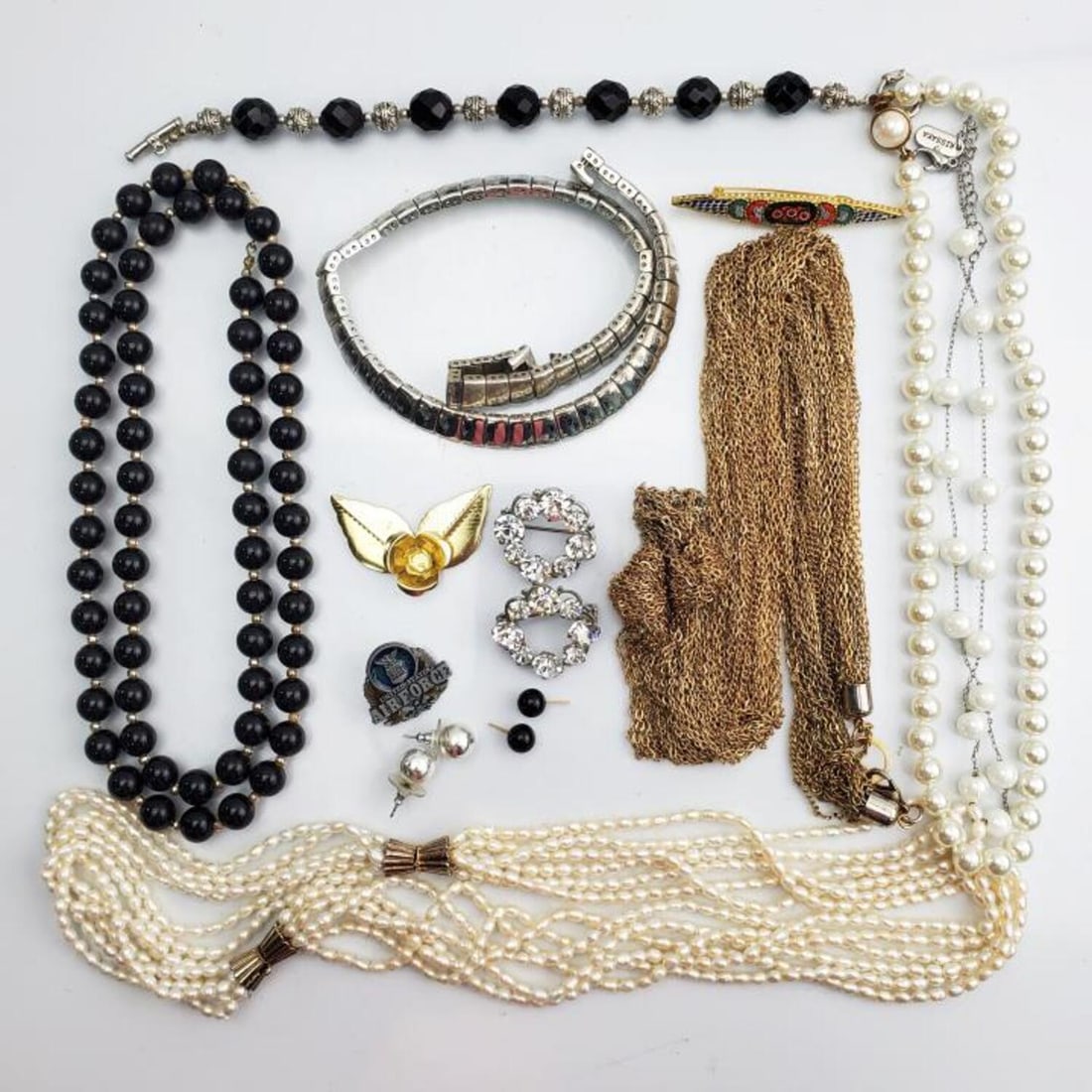 Lot of Costume Jewelry: Lot of Costume Jewelry. Some Are Pearls. Condition: Generally Good. Sold As Is. Dimensions: Various Sizes. Provenance: From a Long Island, NY Home. Please note the absence of a Condition Report does n