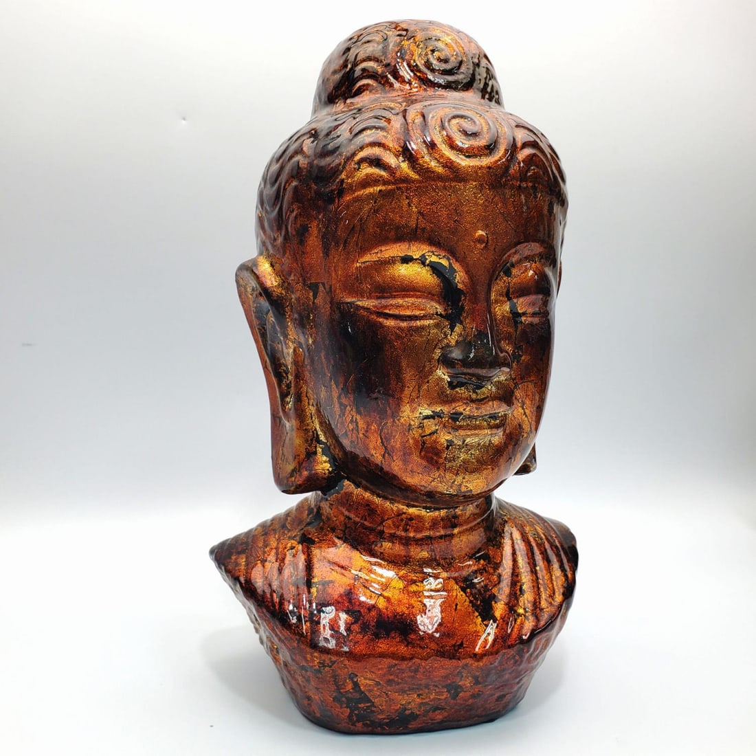 Glazed Bust of Buddha: Glazed Bust of Buddha. Condition: Generally Good, SOLD AS IS. Dimensions: H-12". Provenance: From a Long Island, NY Home. Please note the absence of a Condition Report does not imply that there are no