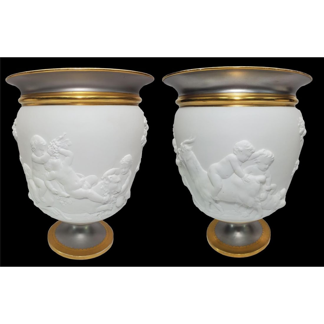 Pair of Antique French Bisque Porcelain Vases: Pair of Exceptional Large Antique French Bisque Porcelain Footed Vases w/ Gold & Platinum Finish. Both Depicting Cherubs in Various Activities. Apparently Unsigned But Attributed to Paris Porcelain. C