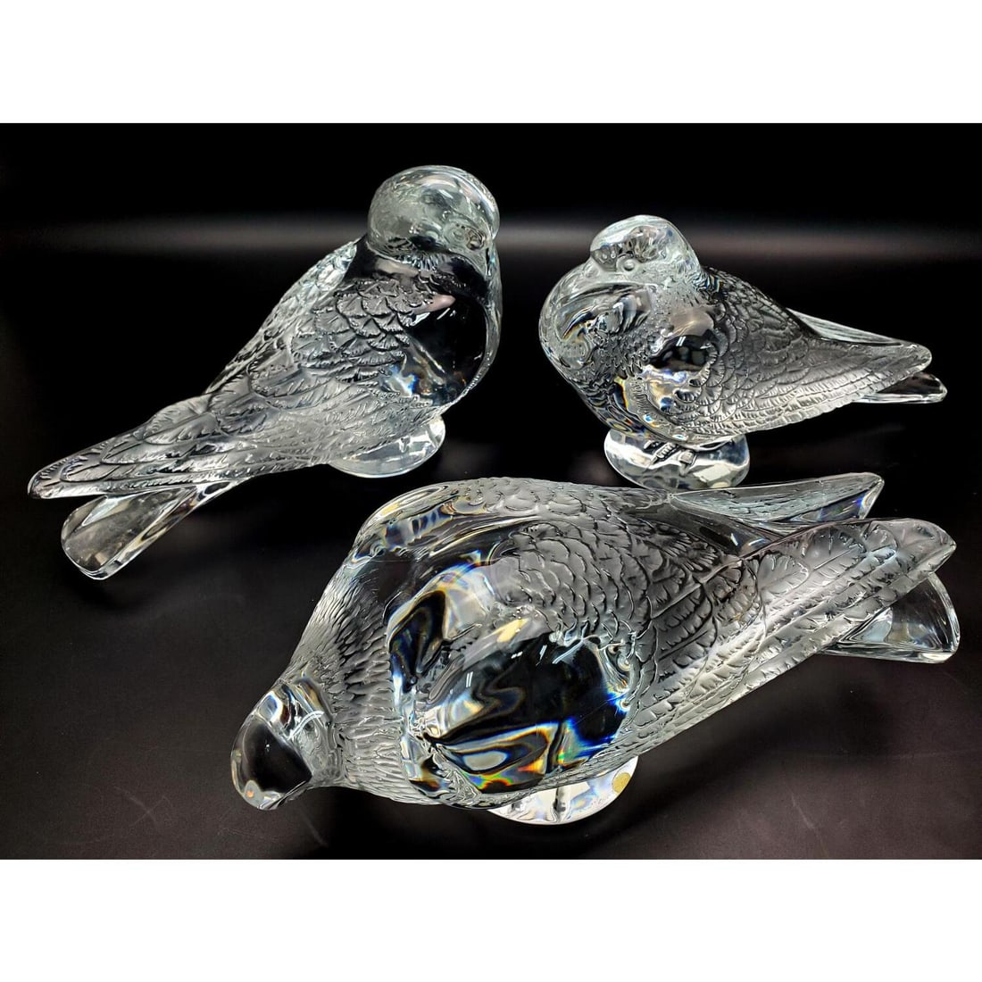 3 Lalique France "Gand Pigeon" Crystal Sculptures: Lot of 3 Lalique France "Gand Pigeon" Crystal Sculptures. Fully Signed. Condition: Generally Very Good. Dimensions: Each L-11" x H-6". Provenance: From a Long Island, NY Home. Please note the absence 