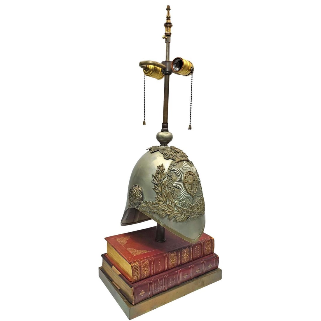 Antique British Albert Helmet Made into a Lamp: Unusual Antique British Albert Helmet Made into a Neoclassical Lamp. Condition: Generally Good. Please Note- We Do Not Guarantee the Workability or Wiring of Any Lamps or Chandeliers. Dimensions: H-26