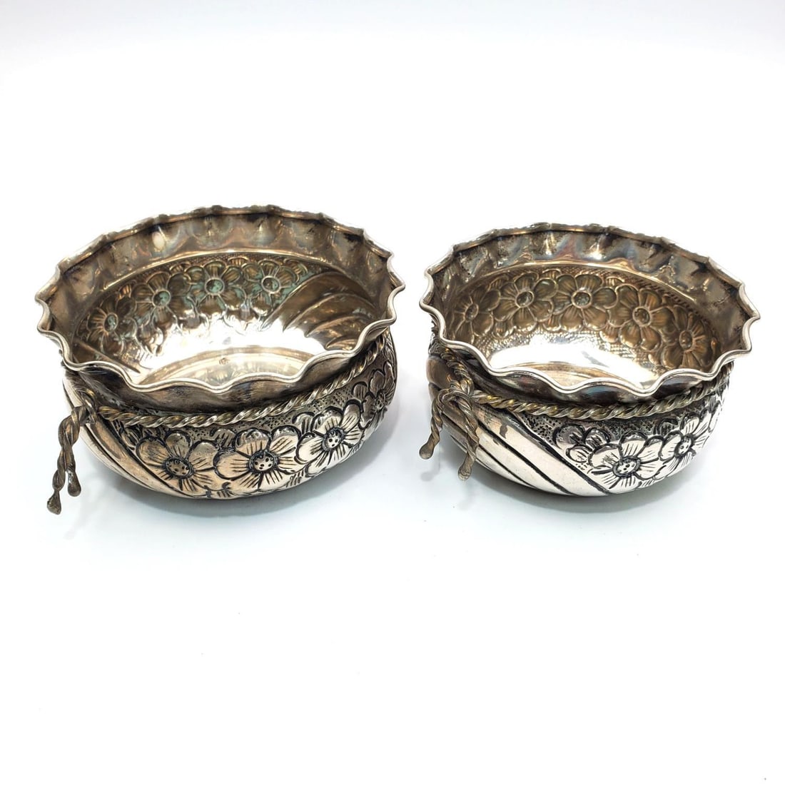 Set of Two 800 Silver Bowls or Wine Tasting Cups: Set of Two 800 Silver Bowls or Wine Tasting Cups w/ Floral Design. Both Fully Hallmarked. Condition: Generally Very Good. Dimensions: Larger-Dia-4" x H-2". Gross Weight: 186.1g/5.9ozt. Provenance: Fro
