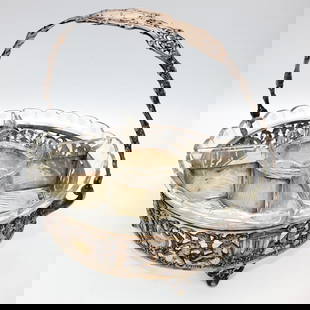Unusual Continental Silver Basket Depicting Cupids: Unusual Continental Silver Basket Depicting Cupids w/ Etched Glass Divided Inserts. Inserts are Removable. Fully Hallmarked. Condition: Generally Good w/ Some Tarnishing. Monogrammed. Dimensions: Dia-