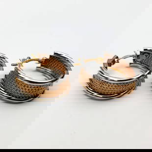 Pair of 14K White & Yellow Gold Hoop Earrings: Pair of 14K White & Yellow Gold Hoop Earrings. Condition: Generally Very Good. Dimensions: Dia-0.75". Gross Weight: 3.0g/1.9dwt. Provenance: From a Long Island, NY Home. Please note the absence of a C