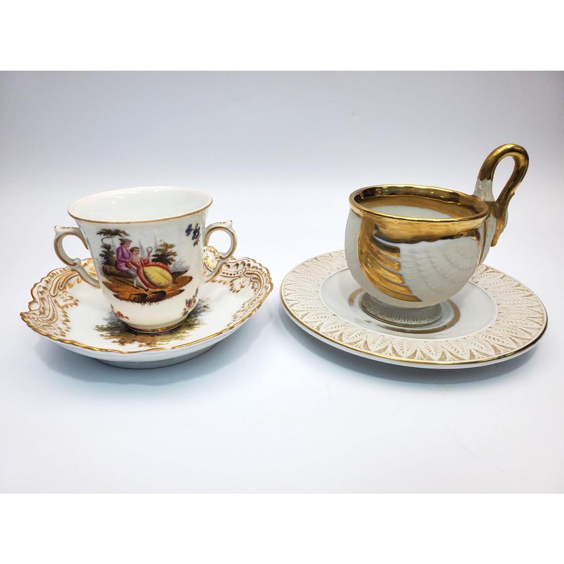 2 Antique Continental Porcelain Cups & Saucers: Lot of 2 Antique Continental Porcelain Cups & Saucers.1 is Dresden, Germany & 1 is French. Condition: No Chips or Cracks. The Saucer of The French Example Has Heavy Gilt Loss. Dimensions: Larger Sauce