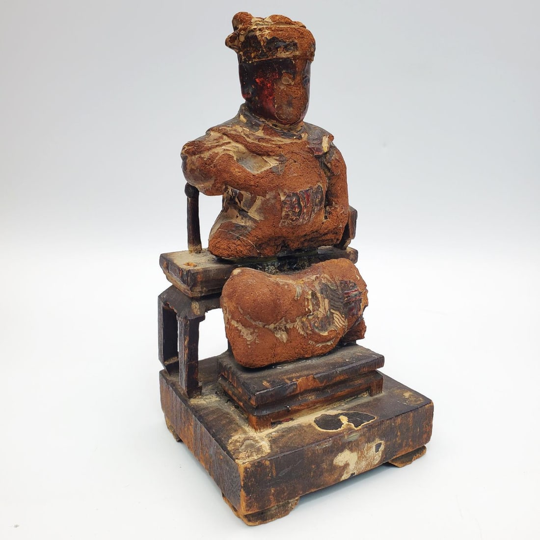 Early Antique Chinese Carved Wood Seated Buddha: 17 or 18 Centuries Antique Chinese Carved Wood Seated Buddha with semiprecious stones.Condition: Sold As Is w/ Losses, repairs and Heavy Paint Loss. Dimensions: H-6.75" x L-3.5" x H-3.25". Provenance: