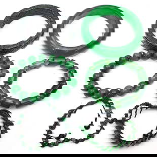 Lot of 6 Chinese Probably Jade Bracelets: Lot of 6 Chinese Probably Jade Bracelets. Condition: Generally Good. Dimensions: Largest Inner Dia-3.25" x Inner Dia-2.5". Provenance: From a Long Island, NY Home. Please note the absence of a Conditi