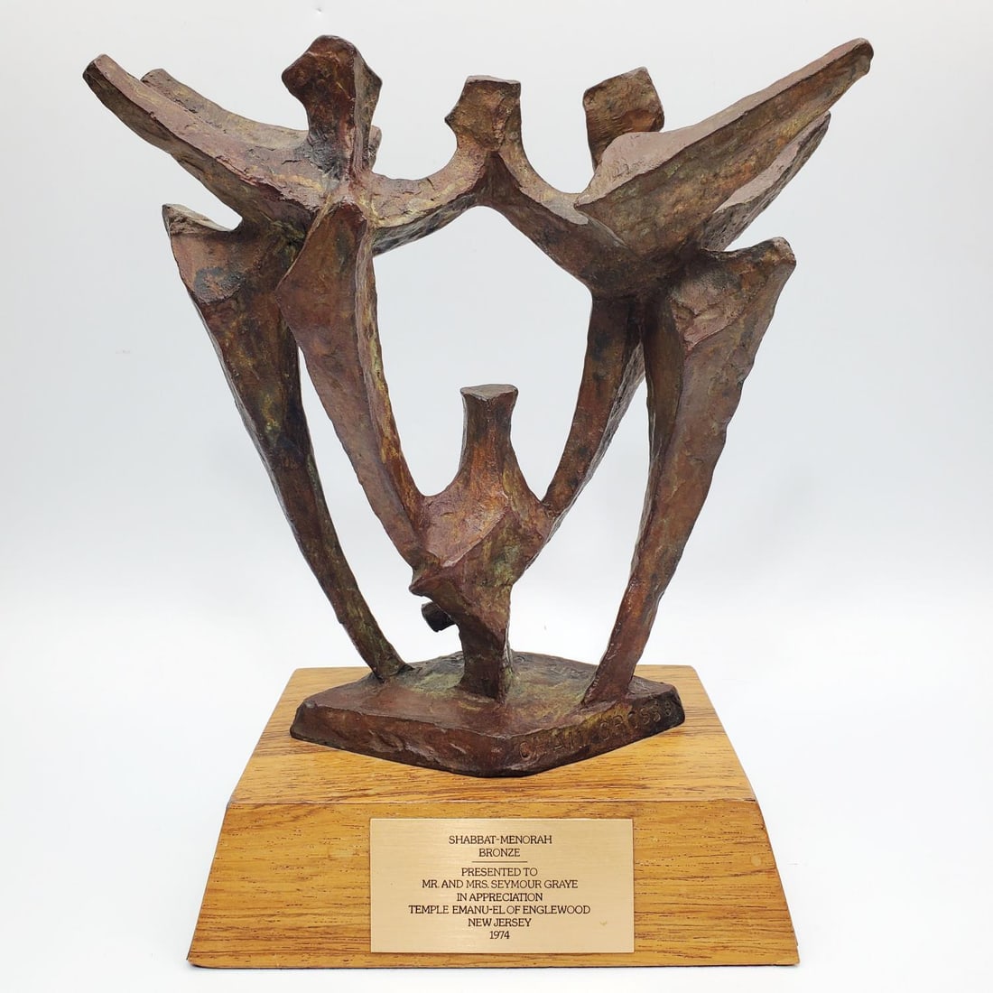 Chaim Gross, American (1904-2004) Bronze: Chaim Gross, American (1904-2004) Bronze "Shabbat-Menorah" on Original Wood Base. Signed in 2 Places & a Foundry Mark of "Bedi-Makky Art Foundry". It is Also Numbered "6". Circa 1974. Bedi-Makkry Art