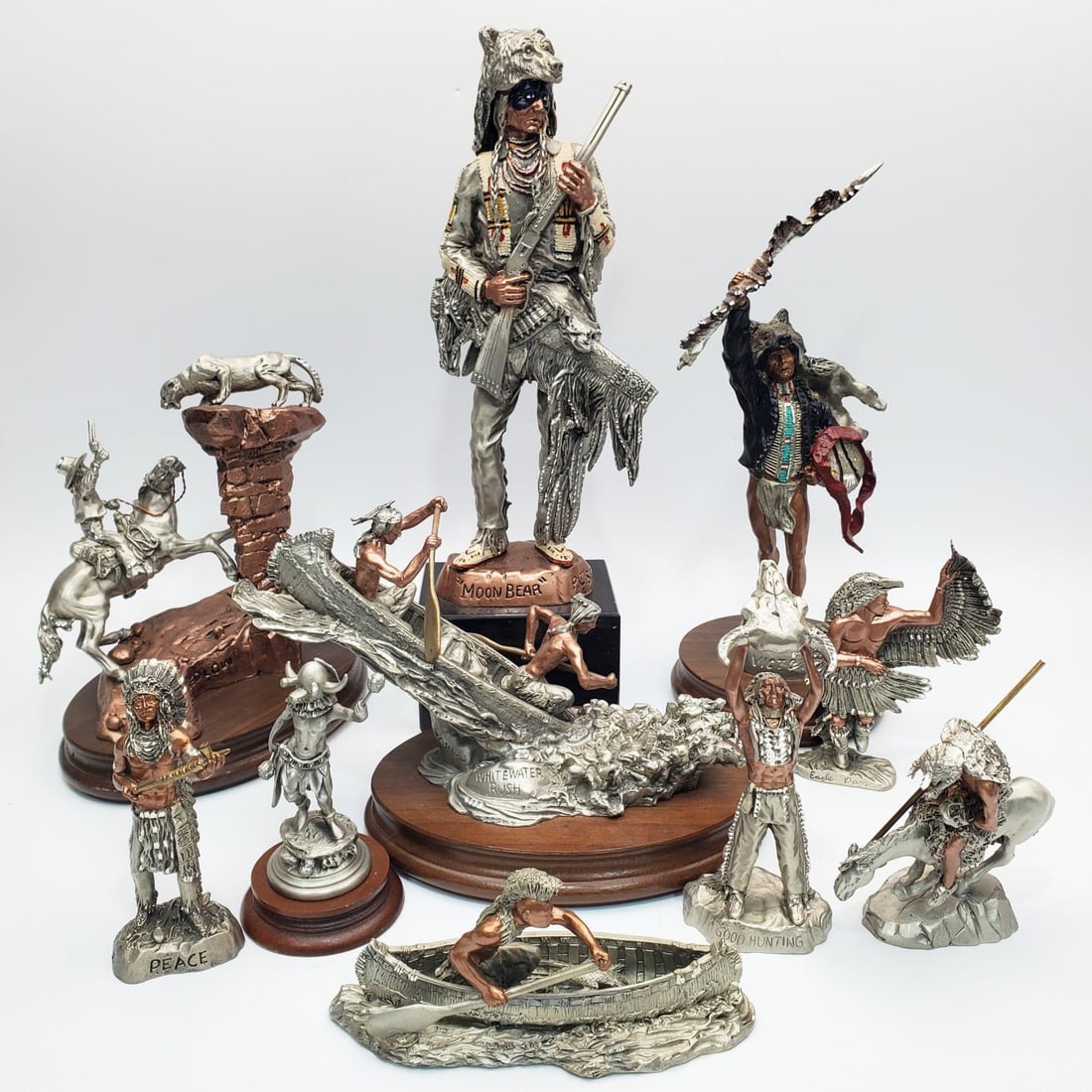 Peter Sedlow, American (b. 1951) Lot of 10 Statues: Peter Sedlow, American (b. 1951). Group Lot of 10 Pewter & Copper Statues of Native American Subjects. All are Signed. Condition: All Generally Very Good. Dimensions: Tallest: H-13.25". Provenance: Fr
