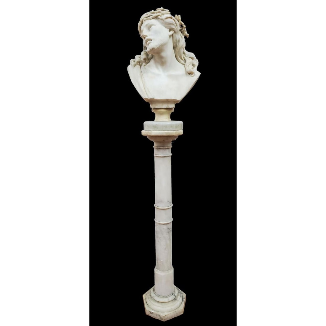 Marble Sculpture of Jesus Incl. a Marble Pedestal: Antique Marble Sculpture of Jesus on a Rotating Base & a Marble Pedestal. Condition: Losses to the Crown & Some Scratches. The Pedestal is Made In Multiple Parts. Please Note that this Item is Very He