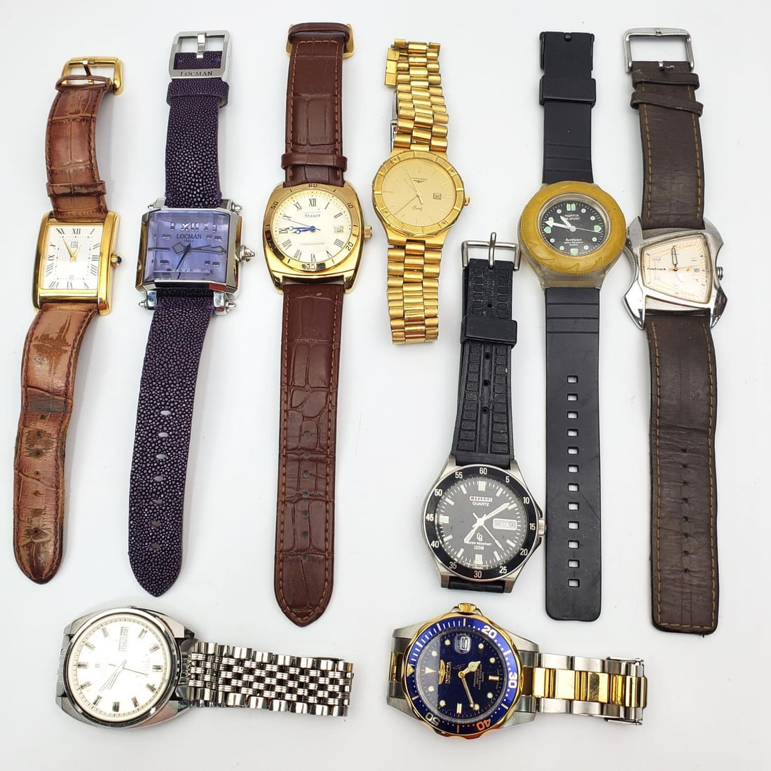 Lot of 9 Vintage Watches of Various Makers: Lot of 9 Vintage Watches of Various Makers Including Longines, Citizen, Invicta, & Others.Condition: Sold As Is. Please Note- We Do Not Guarantee the Workability or Mechanism of Any Watches or Clocks.