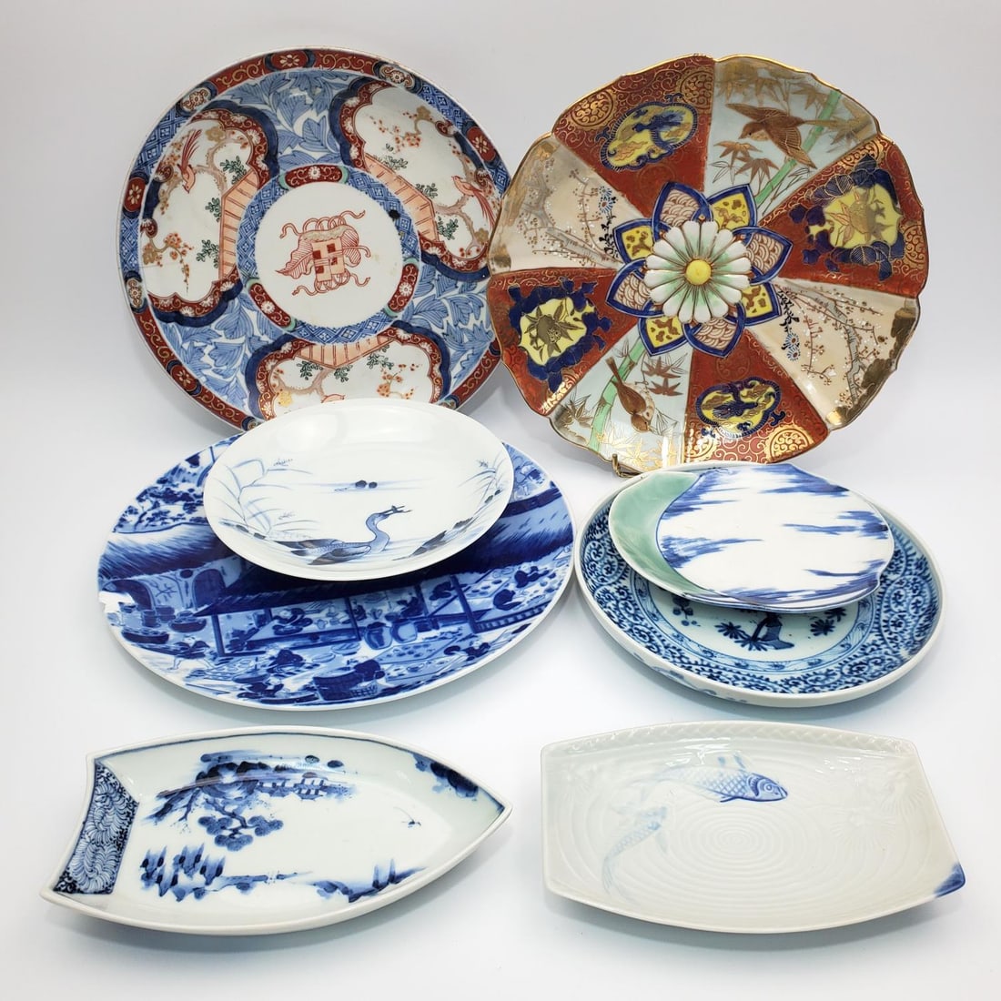 Lot of 8 Japanese Porcelain Dishes Incl. 5 Signed: Lot of 8 Japanese Porcelain Dishes Including 5 Signed. Condition: Generally Good. 1 Has an Old Short Hairline. Some Have Chips & Some Have Paint Losses. Dimensions: Largest Dia-10.75". Provenance: Fro