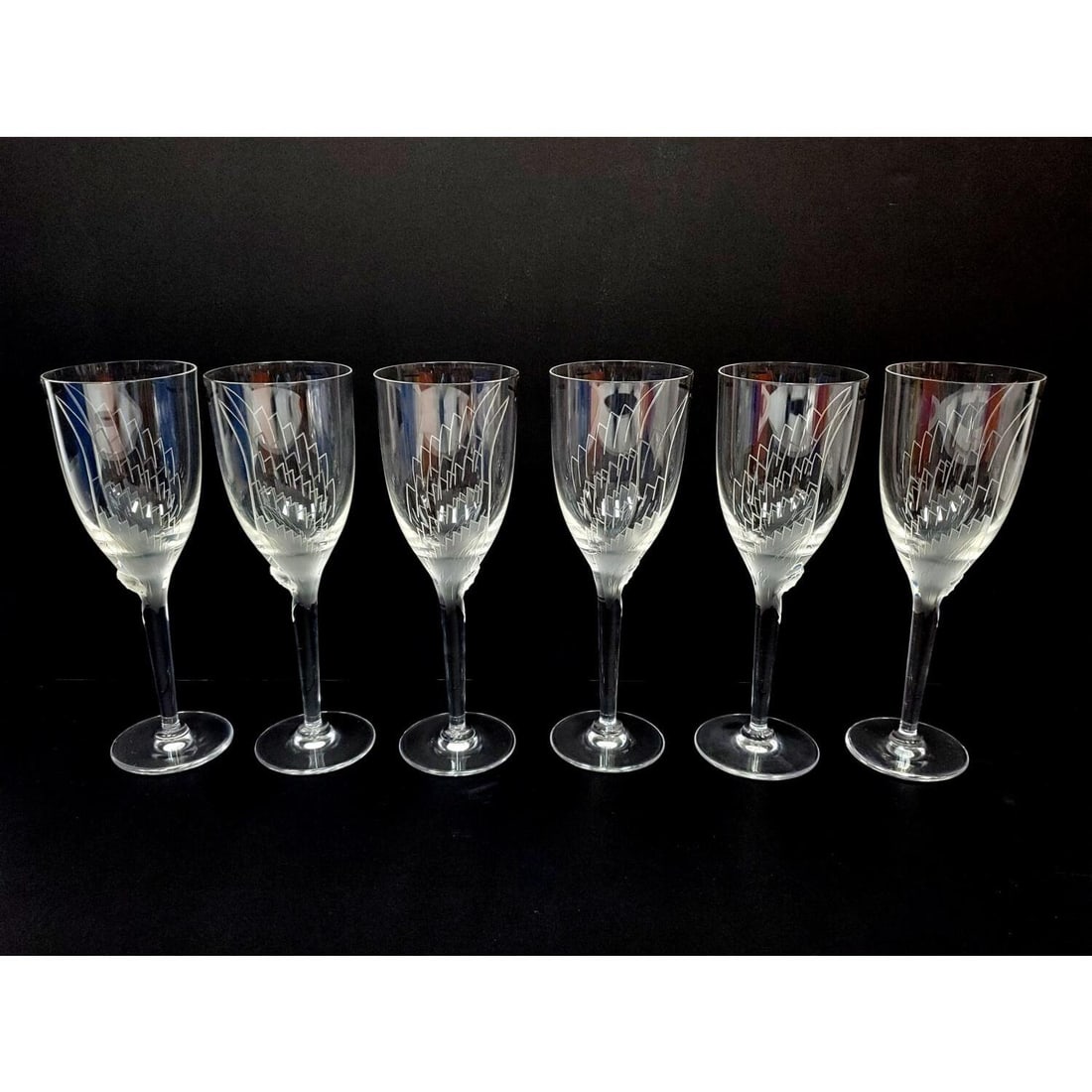 Set of 6 Vintage Lalique Angel Champagne Flutes: Set of 6 Vintage Lalique France " Angel" Champagne Flutes. All Fully Marked w/ Original Lalique Stickers. Condition: Excellent, Never Used. Dimensions: H- 8" Each. Provenance: From a Long Island Home.