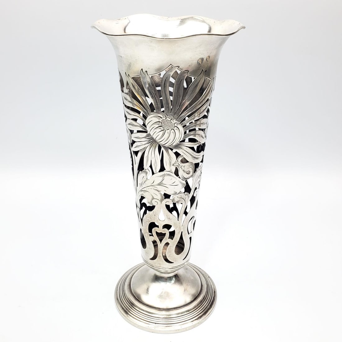 British Antique Reticulated Sterling Silver Vase: British Antique Reticulated Sterling Silver Vase w/ Hand Chased Decorations of Flowers. Fully Hallmarked. Condition: Generally Very Good. Monogrammed & Missing The Glass Insert. Dimensions: H- 10.25"
