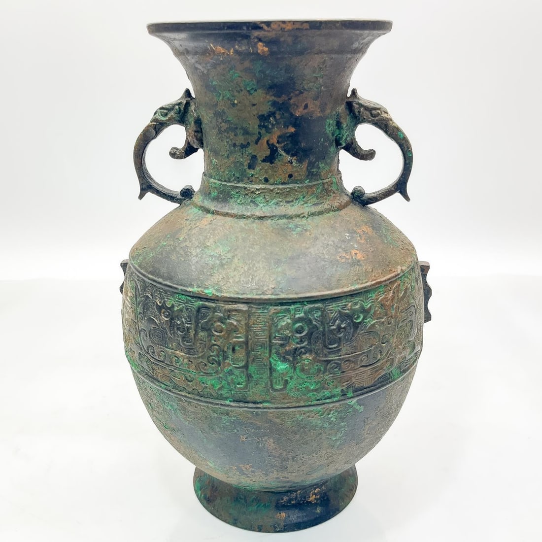 Chinese Bronze Tall Vase: Chinese Bronze Tall Vase. Probably Antique. Condition: Generally Good w/ Heavy Patina. Dimensions: H-10.25" x Dia-7". Provenance: From a Long Island, NY Home. Please note the absence of a Condition Re