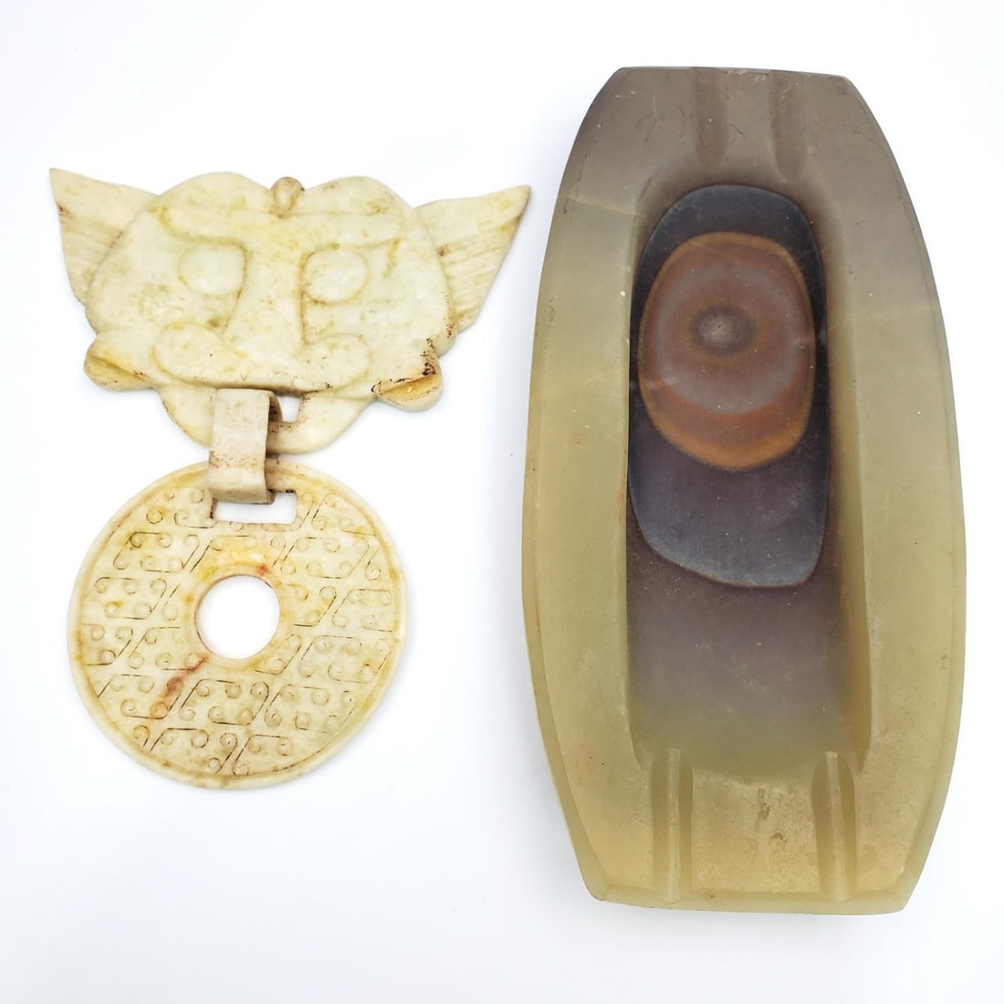 Chinese Carved Hard Stone Bi Along w/ an Ash Tray: Chinese Carved Hard Stone Bi Along w/ a Hard Stone Ash Tray. Condition: As Found.Dimensions: Bi H-6.5" x W-5.25". Provenance: From a Long Island Home. Please note the absence of a Condition Report doe