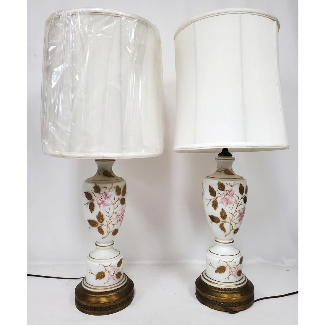Pair of Old Enameled Opaline Glass Lamps: Pair of Old Enameled Opaline Glass Lamps. Condition: Generally Very Good. Please Note- We Can Not Guarantee The Wiring or Workability of Any Lamps. Dimensions: H-31 x Dia-8.5" Not Including Shade. Pro