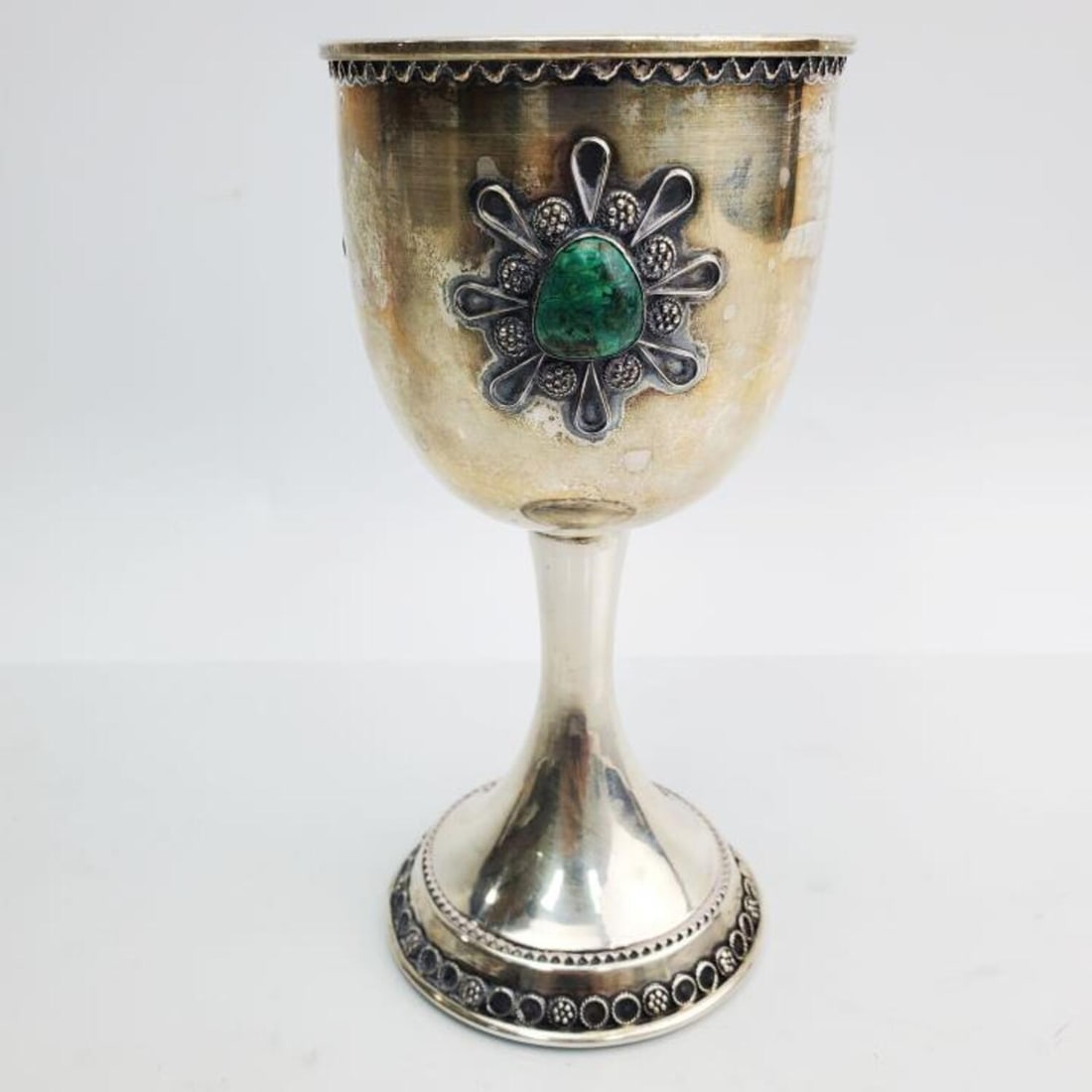 Judaica Sterling Silver Kiddish Cup w/ Malachite: Judaica Sterling Silver Kiddish Cup Inset w/ Malachite Stones. Fully Hallmarked. Has Maker's Mark of Zadok. Made in Israel. Condition: Generally Good with Some Tarnishing Due to Age and Use. Dimension