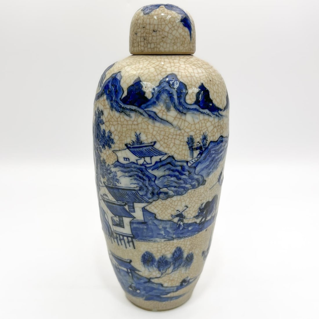 Antique Chinese Blue & White Crackle Porcelain Jar: Antique Chinese Blue & White Crackle Porcelain Covered Jar w/ Decorations of Farm Workers & a Village. Condition: Generally Very Good. Dimensions: H-10" x Dia-4.25". Provenance: From a Long Island, NY