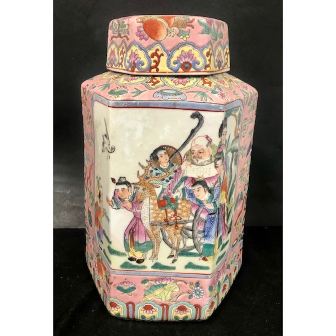 Large Chinese Porcelain Covered Jar: Large Chinese Porcelain Covered Jar Depicting Figures & Flowers. Marked at the Bottom. Condition: Generally Good w/ Light Scratches.Dimensions: H- 14" x W- 9". Provenance: From a Long Island, NY Home.