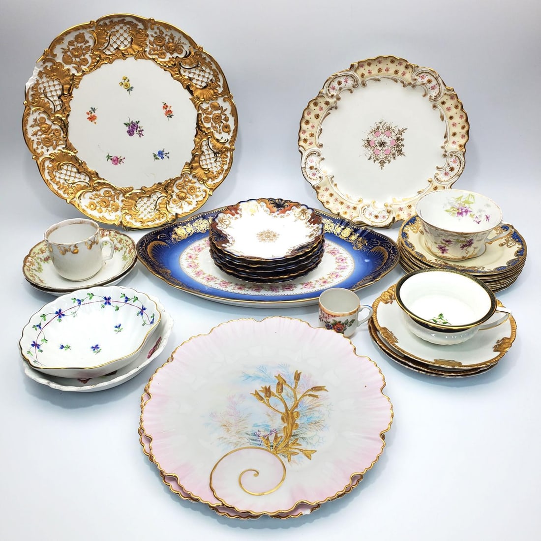 28 PC Lot of Antique Porcelain Items: Very Large 28 Piece Lot of Antique Porcelain Items Including Meissen, Limoges "Theodore Haviland", Spode "Tiffany & Co", Herend, Etc. This Lot Includes Cups, Sauces, Plates, Bowls & Platters. Conditio
