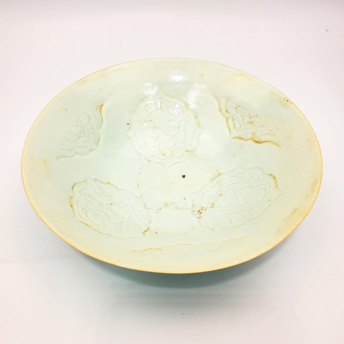 Chinese Celadon Porcelain Bowl: Chinese Celadon Porcelain Bowl. Condition: Generally Good. Dimensions: Dia-8.25" x H-2.5". Provenance: From a Long Island, NY Home. Please note the absence of a Condition Report does not imply that th