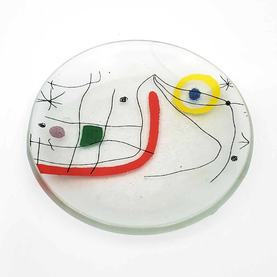 Rare Joan Miro Glass Dish: Rare Joan Miro Glass Dish "L'issue Derobee" Dated1974. Condition: Generally Very Good. Dimensions: Dia-3.25". Provenance: From a Long Island, NY Home. Please note the absence of a Condition Report