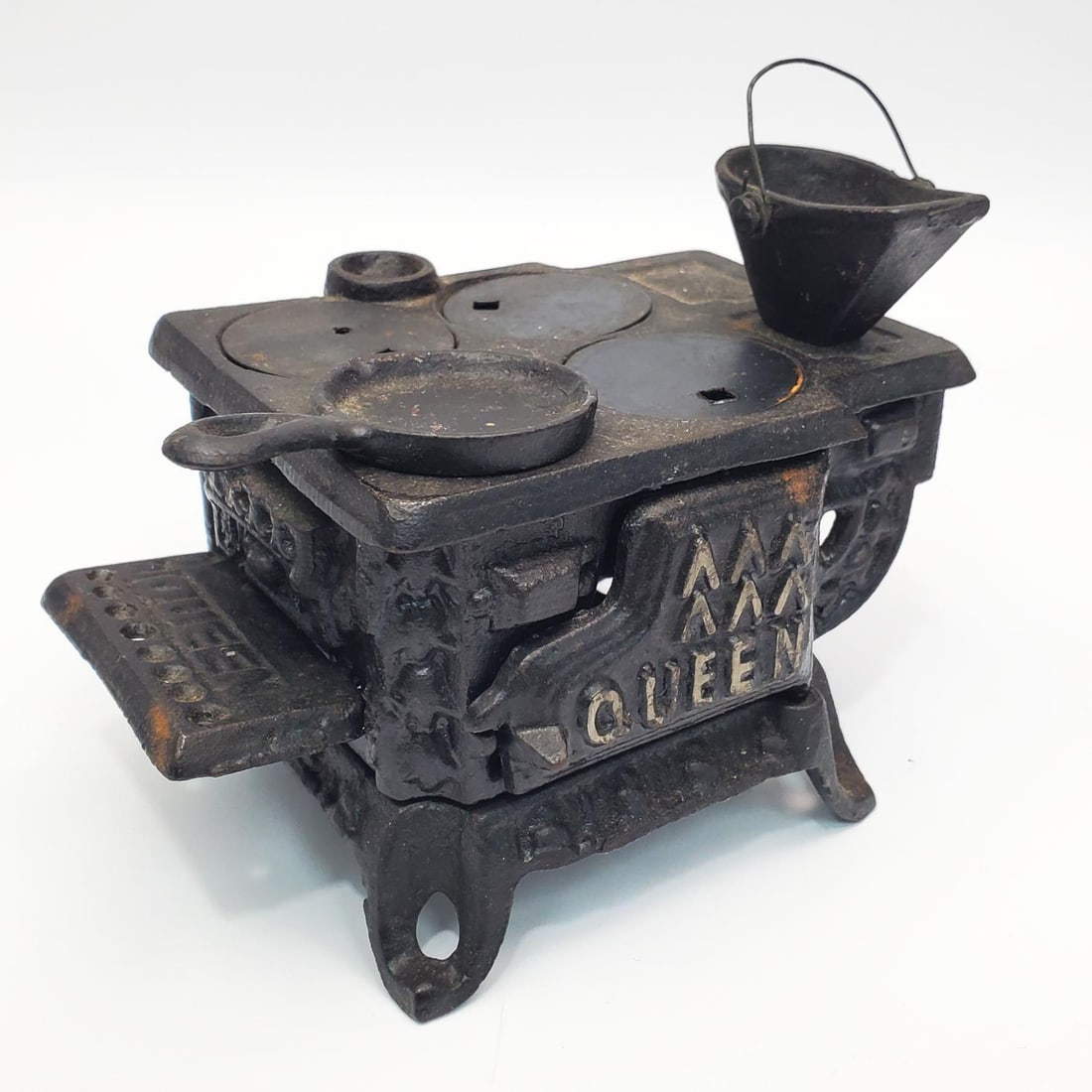 Antique Cast Iron Stove Queen Toy Figure (1 of 3)