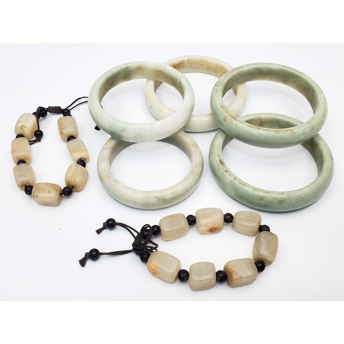 Lot of Chinese Hard Stone Bracelets & Necklaces: Group Lot of Chinese Hard Stone Bracelets & Necklaces.Condition: Generally Good As Found. Dimensions: Various Sizes. Provenance: From a Long Island, NY Home. Please note the absence of a Condition Rep