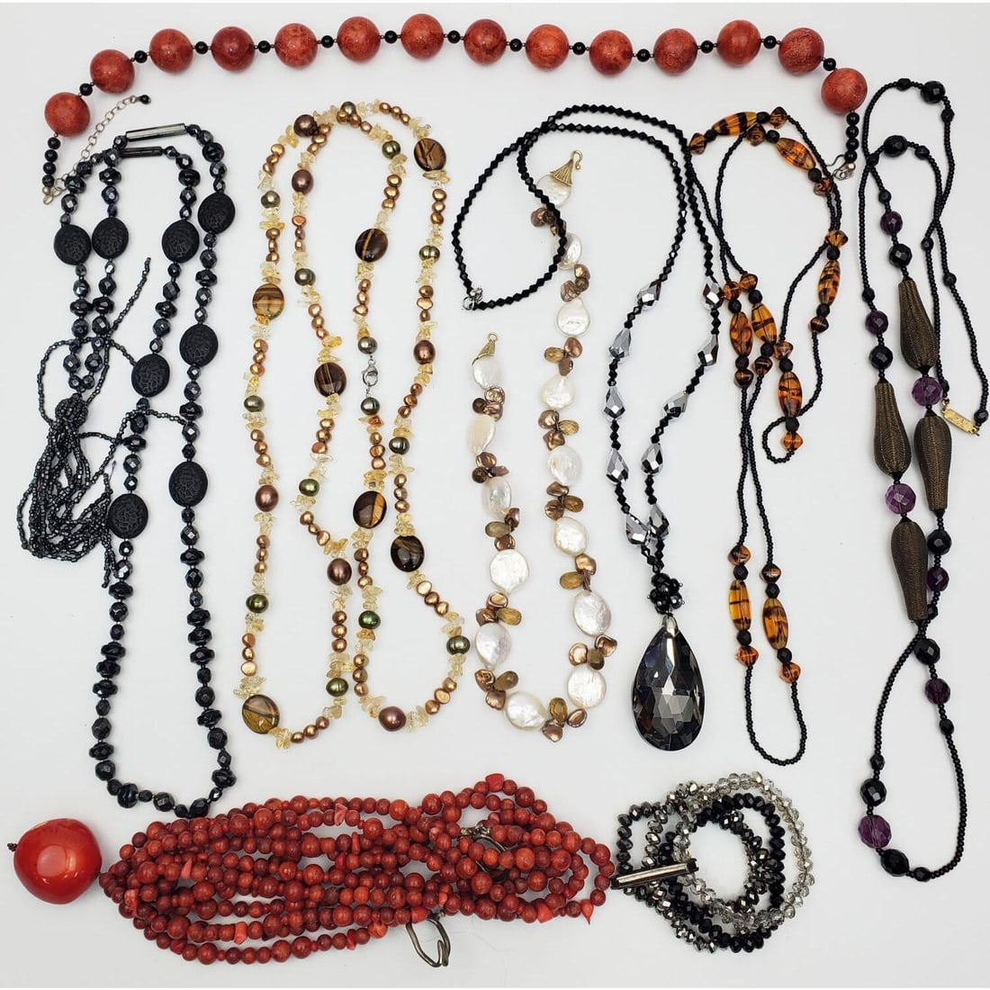 Fine Lot of Old & Vintage Costume Jewelry: Fine Lot of Old & Vintage Costume Jewelry. May Include Examples of Coral & Silver. Condition: Generally Good, As Found. Dimensions: Various Sizes. Provenance: From a Long Island, NY Home. Please note