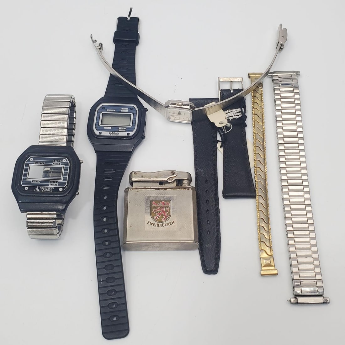 Group Lot of Vintage Watches, Watch Parts, Etc.: Group Lot of Vintage Watches, Watch Parts, & Lighter.Condition: As Found. Please Note- We Do Not Guarantee the Workability or Mechanism of Any Watches or Clocks. Dimensions: Various Sizes. Provenance: