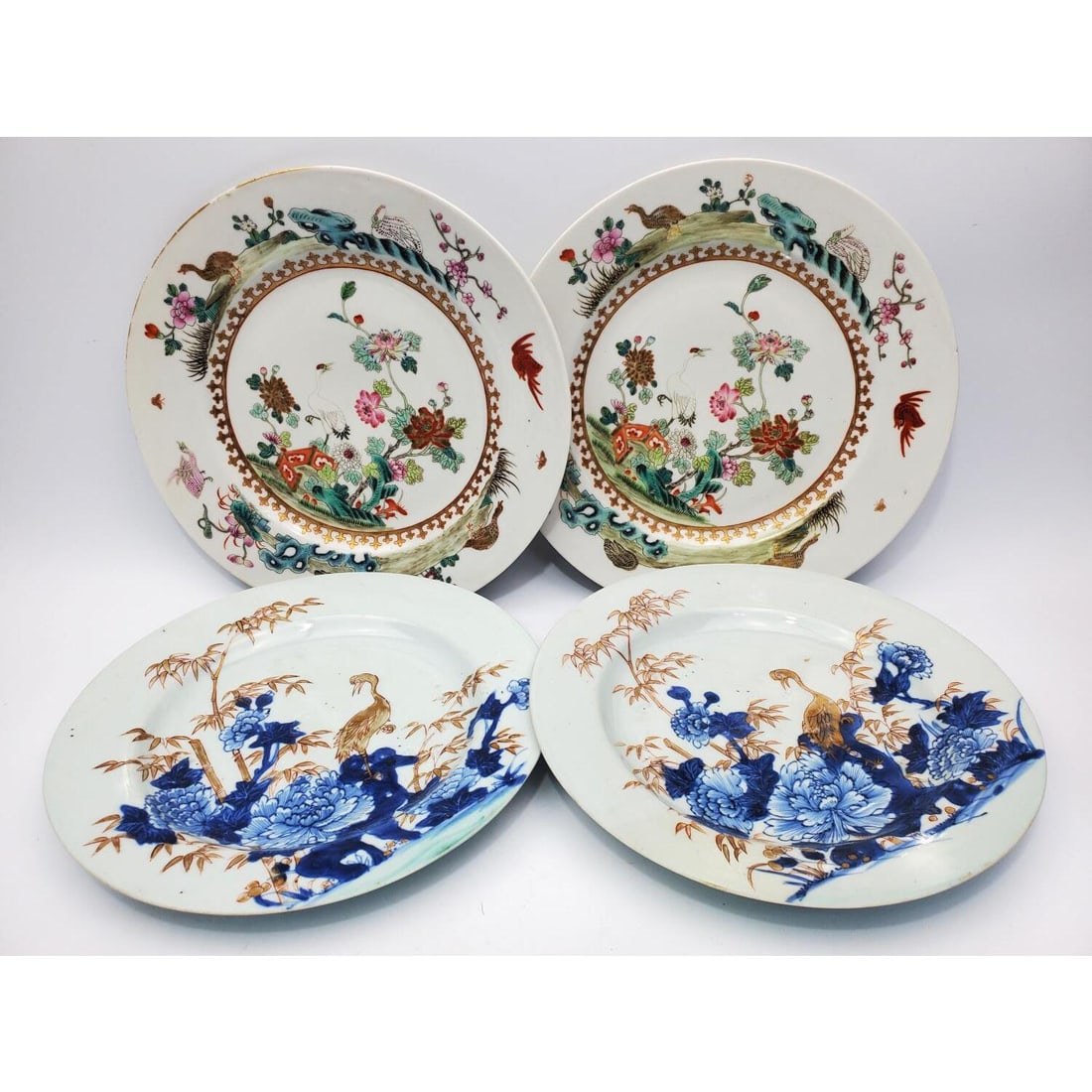 2 Pairs of Chinese Porcelain Plates: 2 Pairs of Chinese Porcelain Plates. 2 Plates w/ Red Seals on The Bottom. Condition: Generally Good. Dimensions: Larger-Dia-9.75" Provenance: From a Long Island, NY Home. Please note the absence of a