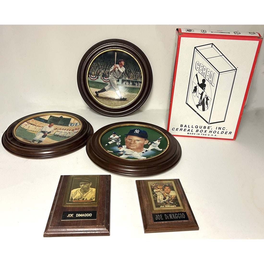 Lot of 6 Vintage Sports Memorabilia Items: Lot of 6 Vintage Sports Memorabilia Items Including a BallQube Cereal Box Holder w/ a Collector's Box of Cereal, 3 Collector's Plates in Frames, & 2 Small Plaques. Condition: Generally Good. Dimension