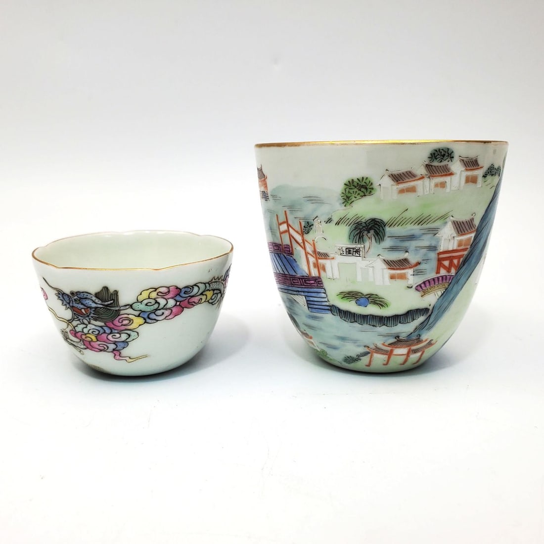 Lot of 2 Chinese Signed Porcelain Cups: Lot of 2 Chinese Signed Porcelain Cups. Condition: Generally Very Good. Dimensions: Larger Dia-2.5" x H-2.5". Provenance: From a Long Island, NY Home. Please note the absence of a Condition Report doe