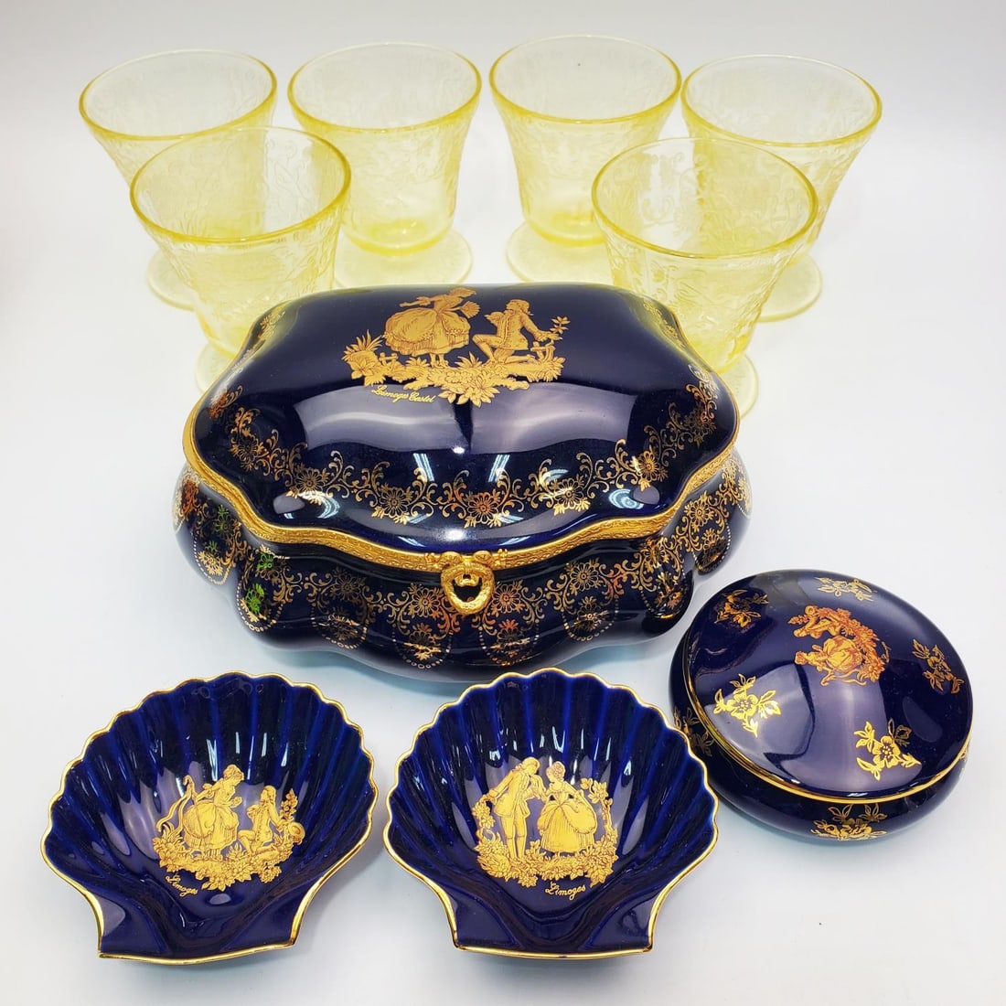 Lot of 6 Vintage Etched Yellow Glass Cups: Lot of 6 Vintage Etched Yellow Glass Cups Along w/ 4 Limoges France Porcelain Items. Condition: Generally Very Good. Dimensions: Largest (Limoges Box)-L-7" x W-5" x H-3.5". Provenance: From a Long