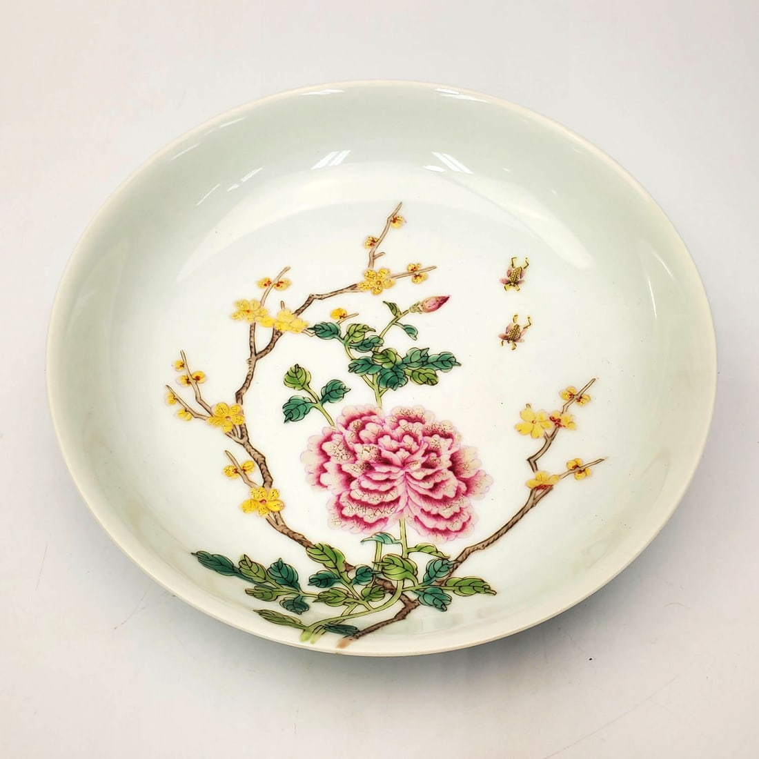 Chinese Porcelain Plate Depicting Flowers: Chinese Porcelain Plate Depicting Flowers, Branches & Insects. Marked at the Bottom. Condition: Generally Very Good. Dimensions: Dia- 8". Provenance: From a Long Island, NY Home. Please note the