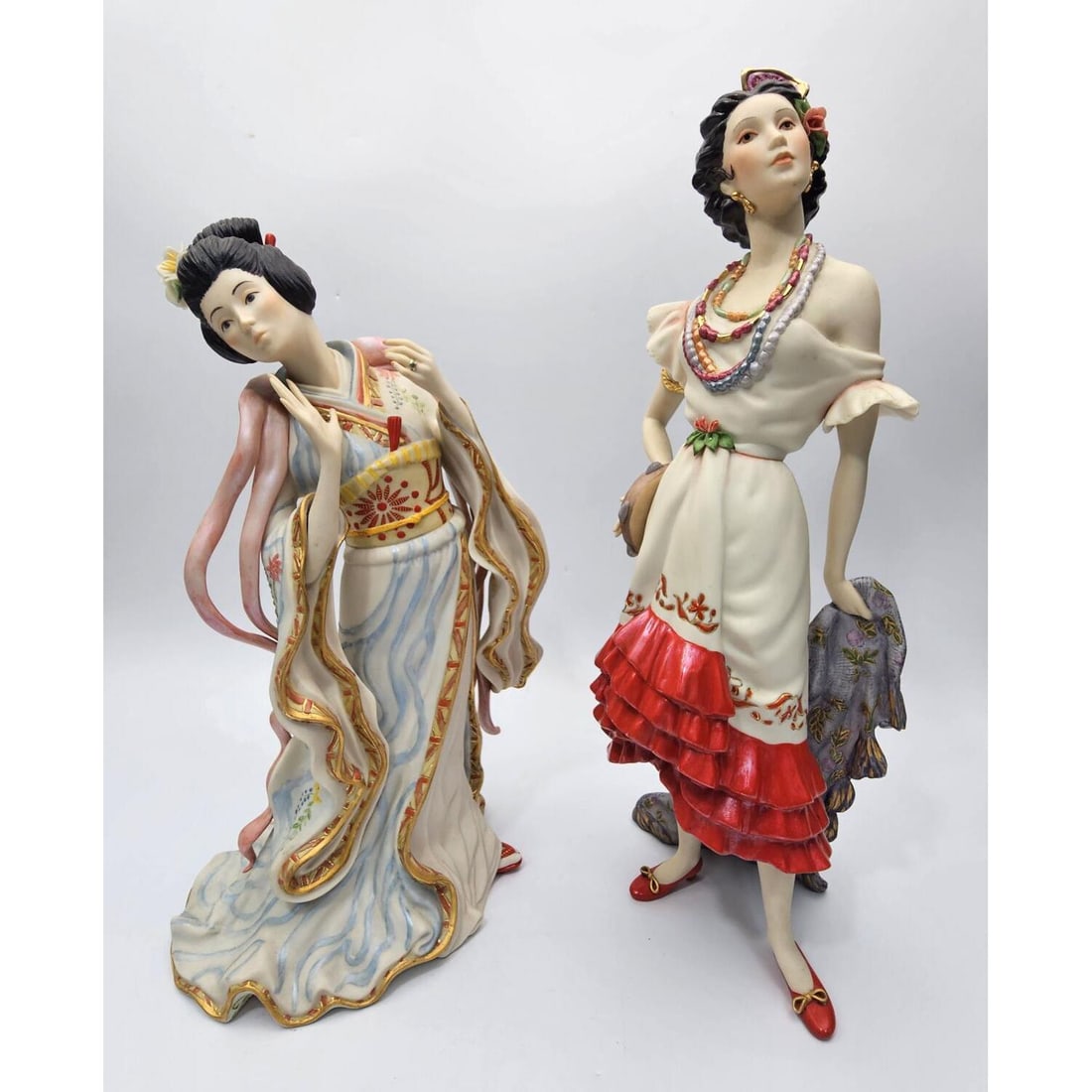 2 Limited Edition Cybis Bisque Porcelain Figures: 2 Limited Edition Cybis Bisque Hand Painted & Gilt Decorated Porcelain Figures Including "Madame Butterfly" & "Carmen Gypsy". Both Are Fully Signed & Numbered. C.1980's. Condition: Generally Very Good